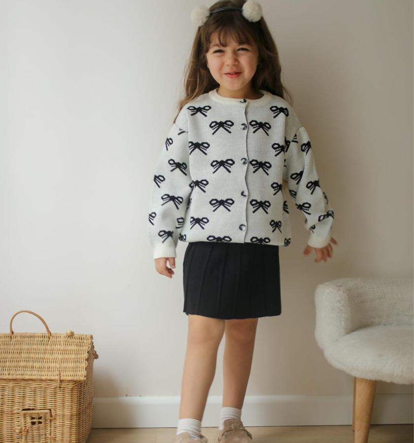 Kız çocuk kurdale detaylı etekli triko takım