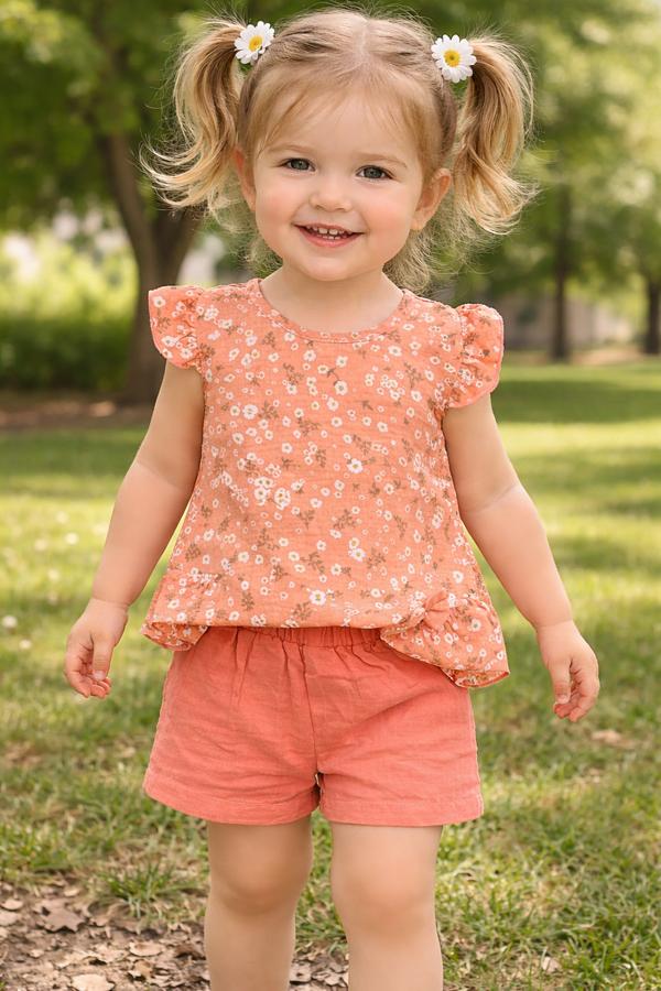 Çiçek baskılı Kol ve bel fırfırlı müslin kız bebek